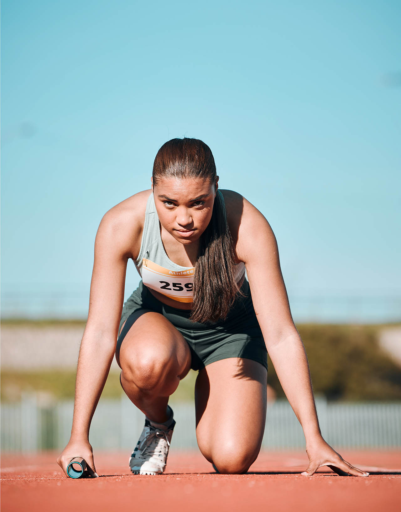 start-running-and-fitness-with-woman-on-race-trac-2025-04-06-02-27-06-utc